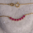Gold-plated 925 sterling silver chain necklace with central motif of seven pink zircon stones in a modern line