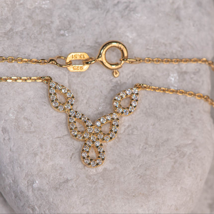 Gold-plated 925 sterling silver chain necklace with delicate openwork motif and clear zircon stones