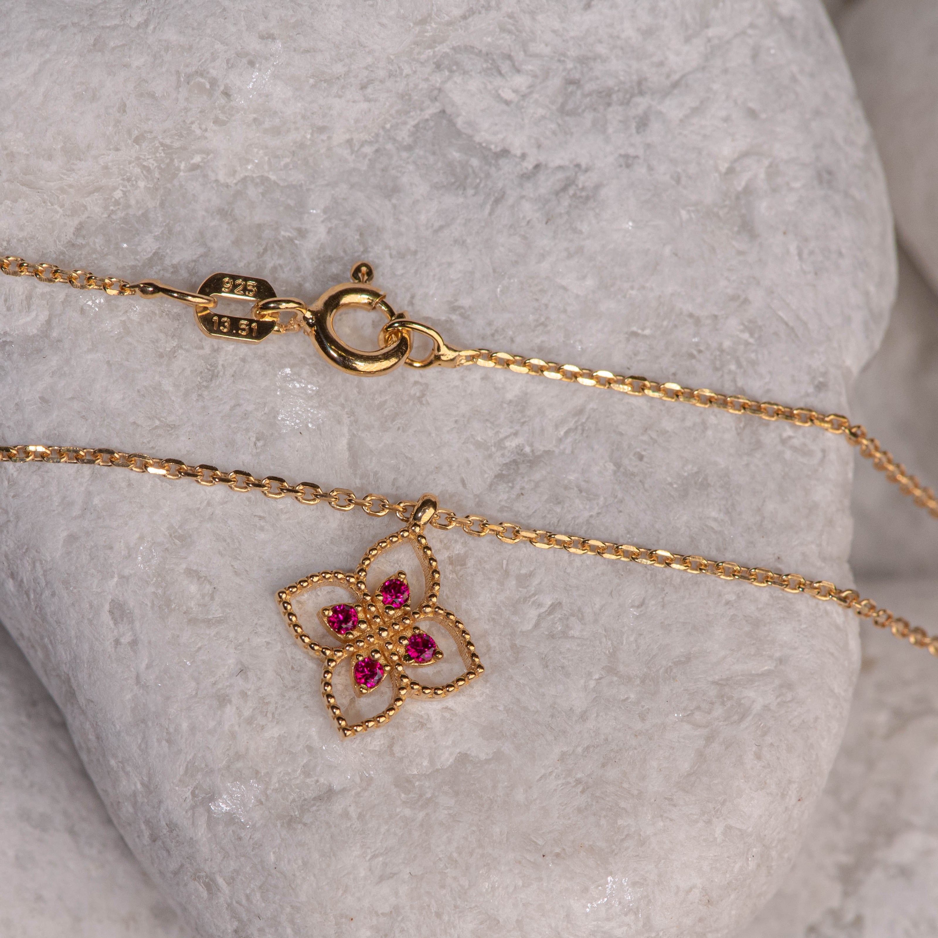 Gold-plated 925 sterling silver pendant necklace with flower-shaped motif and four pink zircon stones